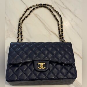 Navy Blue CHANEL quilted caviar double flap bag in excellent condition!